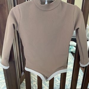 LainSnow one piece bathing suit size 6-12 months. Worn once